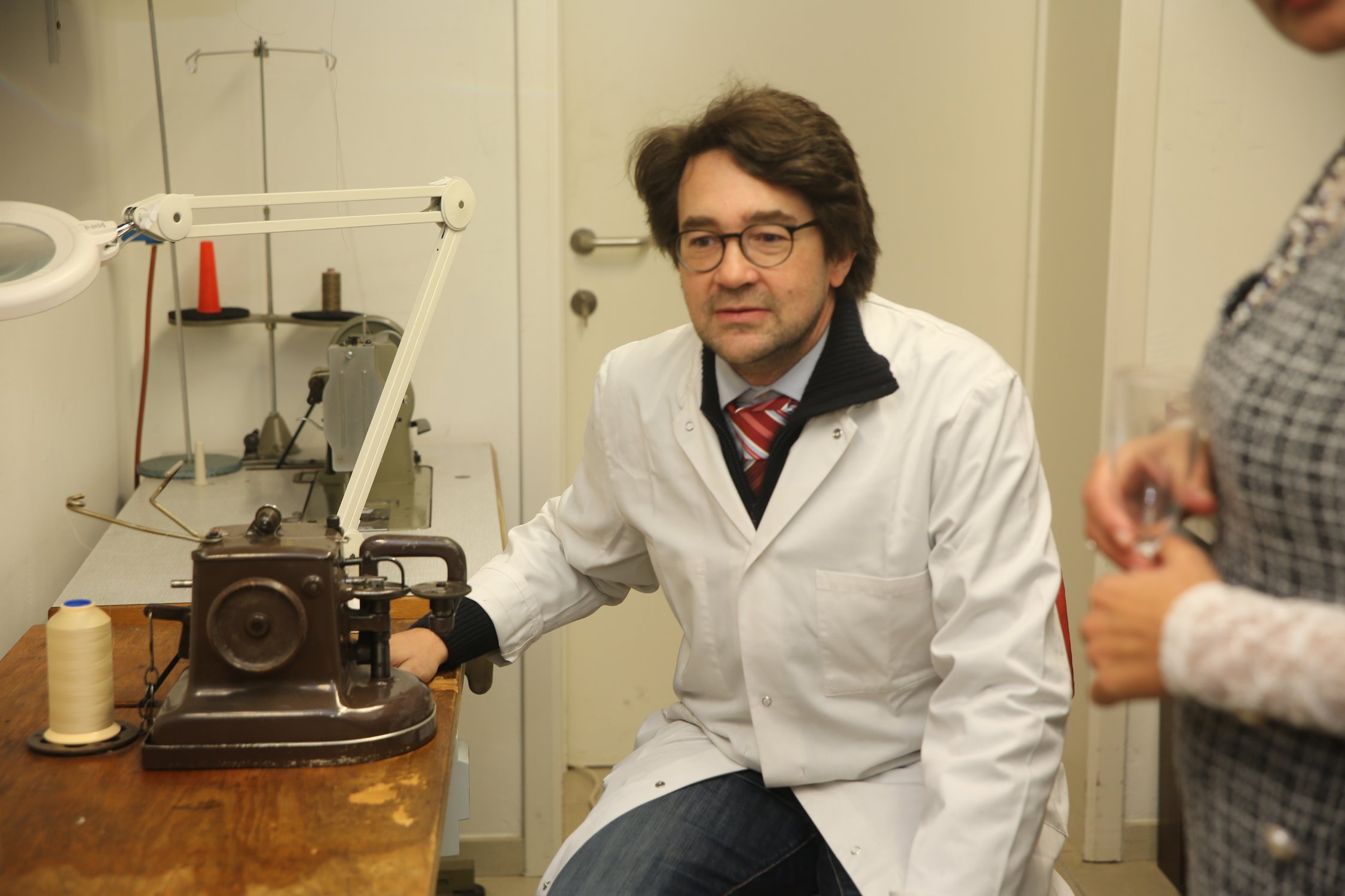 Portrait of Lionel at the furrier's machine